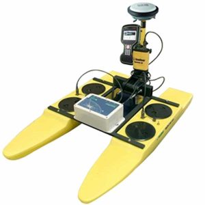 A yellow Seafloor Hydrone™ RCV G4 with an electronic device on it.