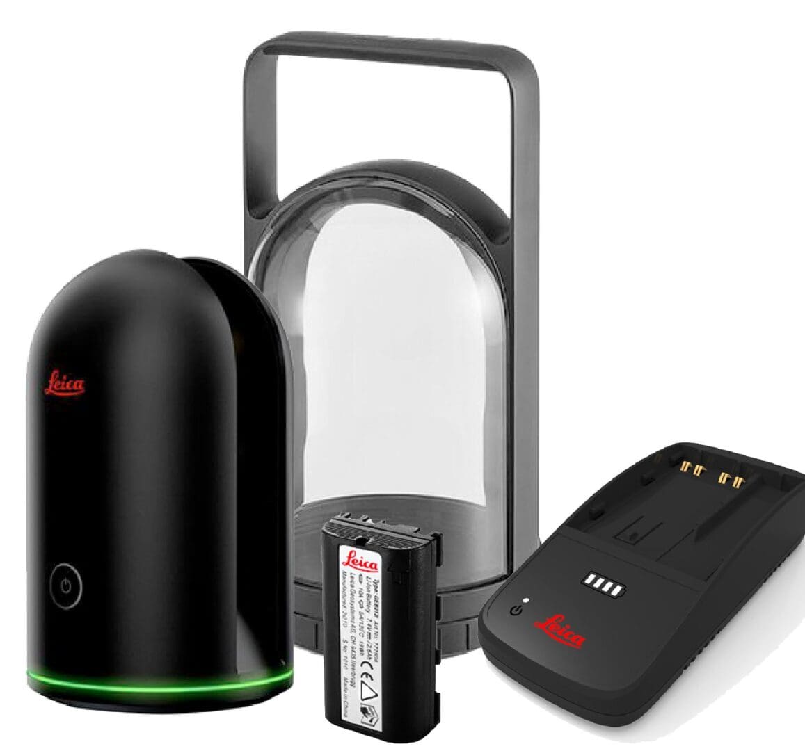 Leica surveying equipment with battery and charger.