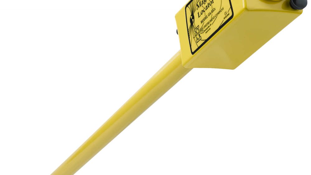 A yellow Schonstedt GA-52Cx Magnetic Locator with a black handle on a white background.