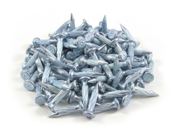 A pile of Chrisnik MagNails on a white background.