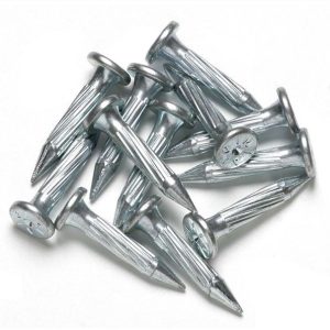 A pile of metal nails on a white background.