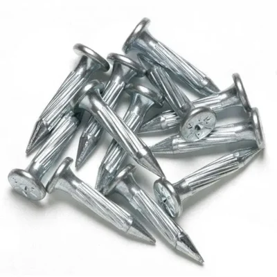 A pile of metal nails on a white background.