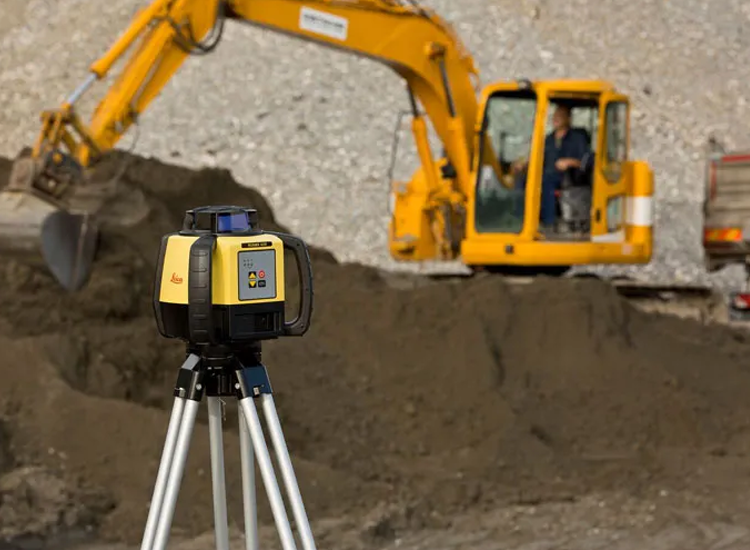 Construction laser level on tripod.