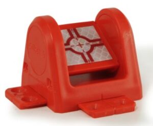 Red toy component with patterned screen.