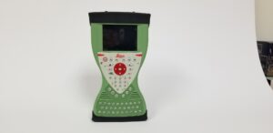 Green electronic device with buttons and screen.