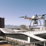 Drone flying over a cityscape.
