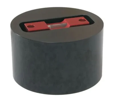 Red level tool in a black circular holder.