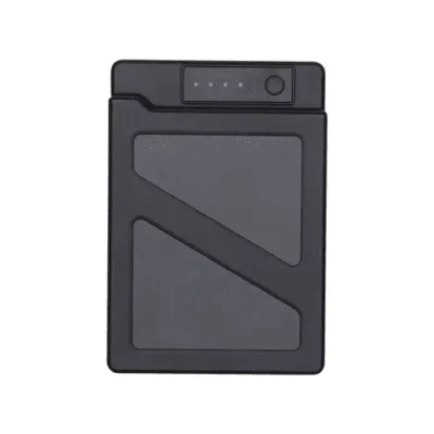 Black drone battery with indicator lights.