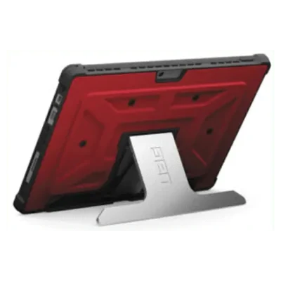 Red tablet with rugged case on stand.