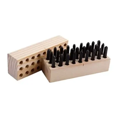 Wooden box of metal letter stamps.