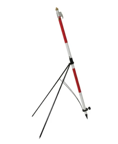 Red and white surveying pole on tripod.