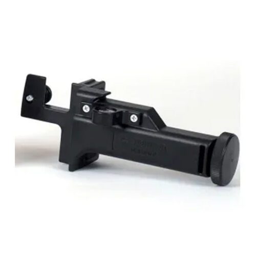 Black plastic firearm accessory or alignment tool.