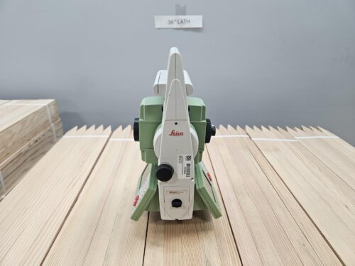 Leica total station on wooden slats.