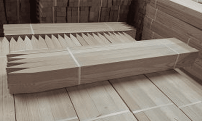 Stacked wooden pieces arranged neatly.