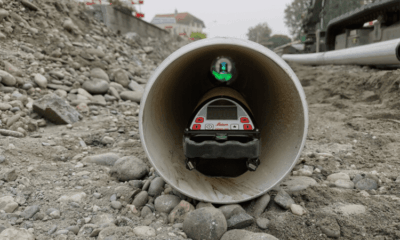 Laser equipment inside a construction pipe.