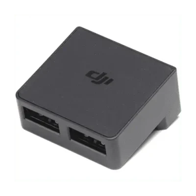 Black DJI dual USB charging hub.