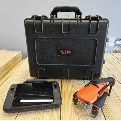 Drone with controller and carrying case.