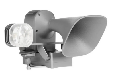 Outdoor light with motion sensor and horn.