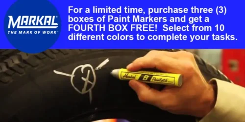 Hand using yellow marker on tire.